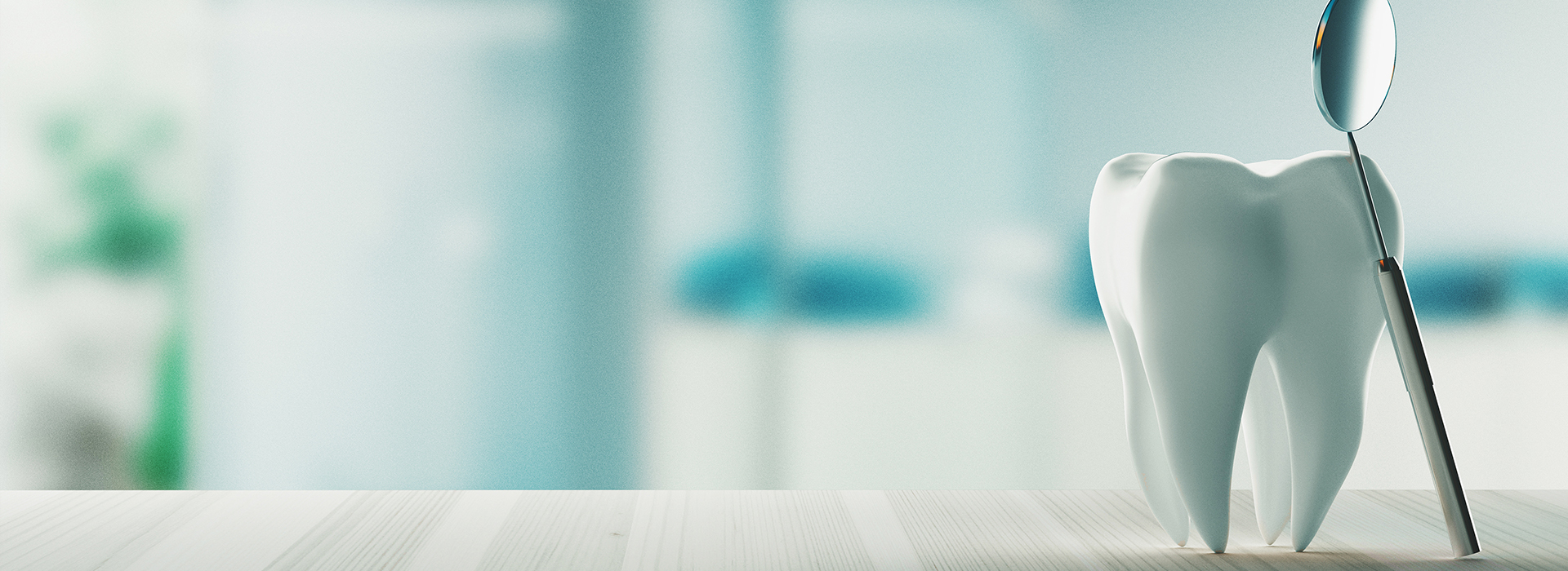 An animated toothbrush with a human-like hand, placed on a white countertop in a blurred office setting.